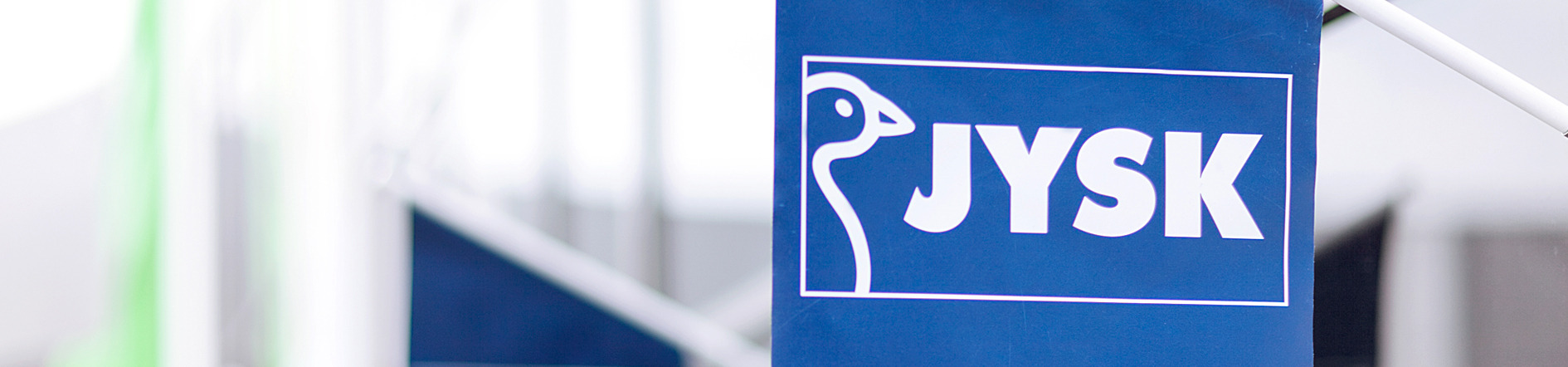 Ο όμιλος JYSK Σημαία με το logo της JYSK