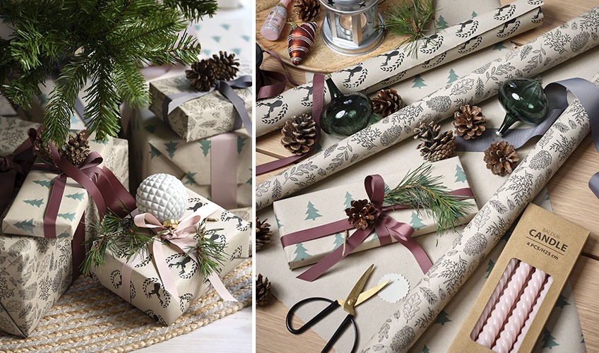 Χριστουγεννιάτικα δώρα στολισμένα με χριστουγεννιάτικες μπάλες, κουκουνάρια και κλαδάκια